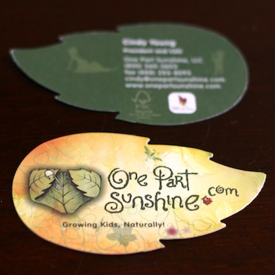 OnePartSunshine.com leaf-shaped business card using FSC 100% recycled paper and waterless printing