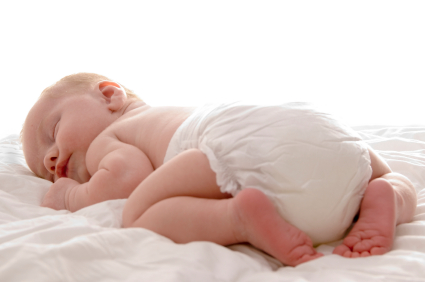 baby in natural organic cloth cotton reusable diaper
