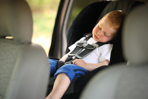 toddler sleeping in car seat