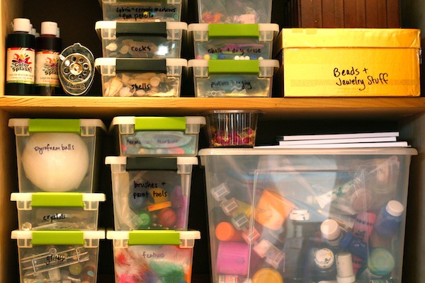 Plastic Bins in a Cabinet are a Great Way to Organize Art Supplies | OnePartSunshine.com